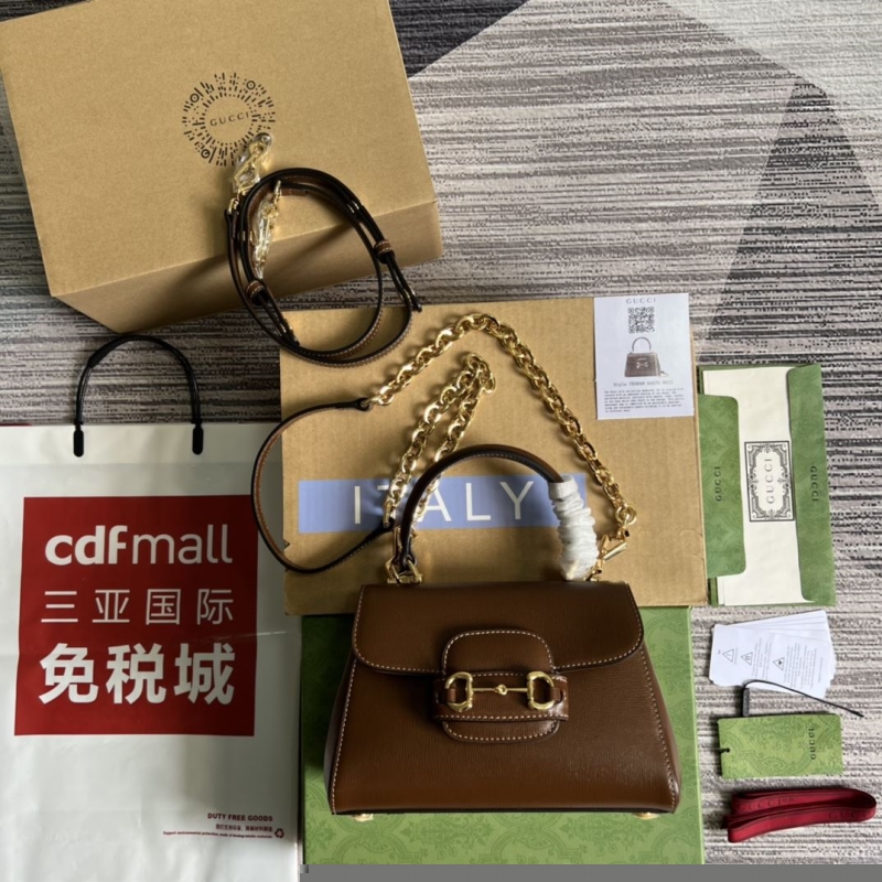 G*u*i top handle bags